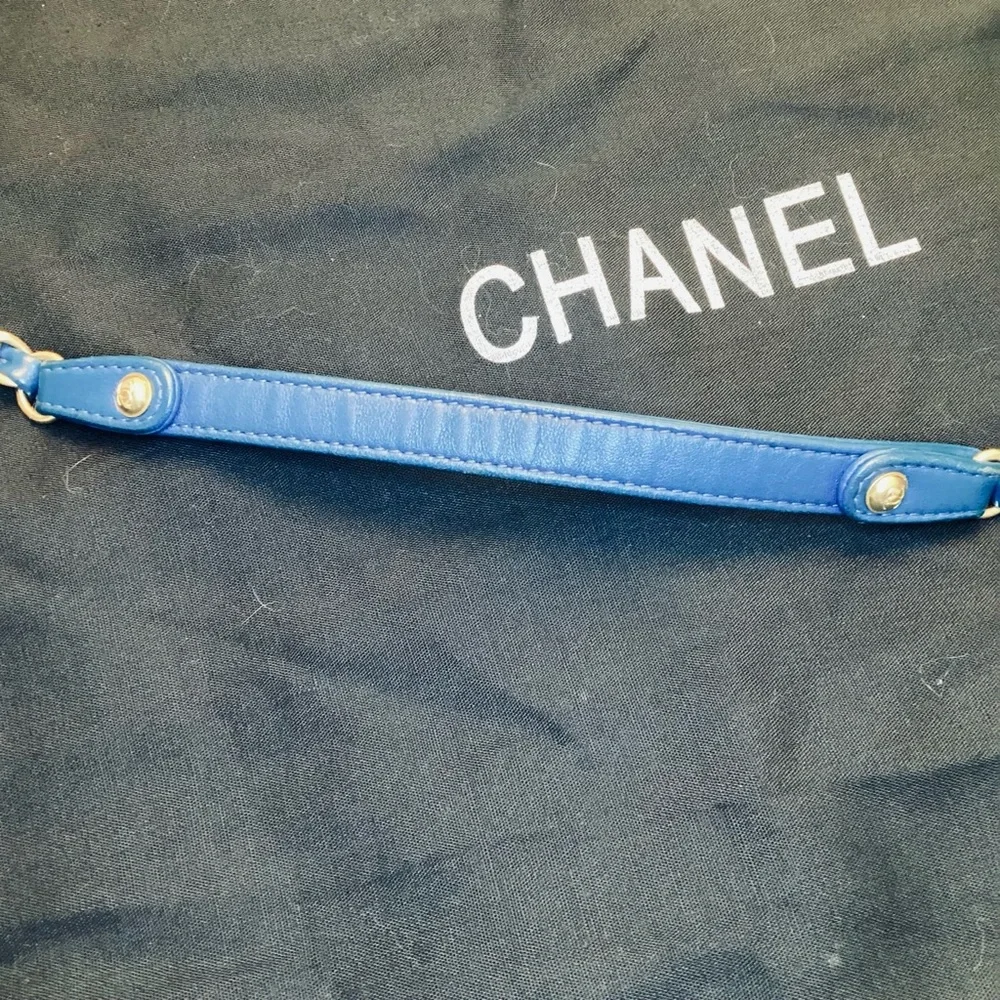 CHANEL flap zippered strap